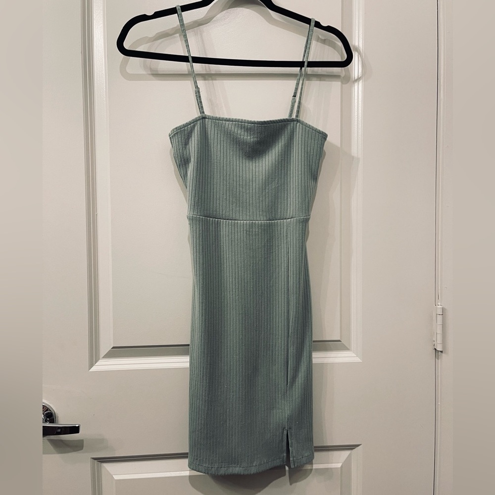 Mint green mini dress with adjustable straps (minor piling) Size XS